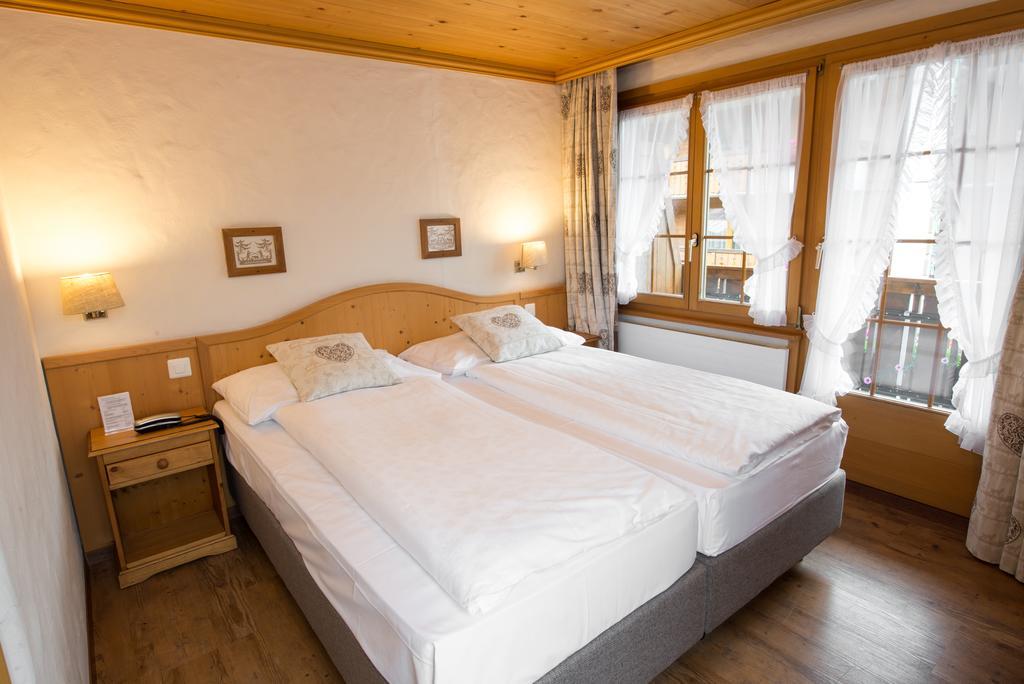Sporthotel Victoria Gstaad Pokoj fotografie